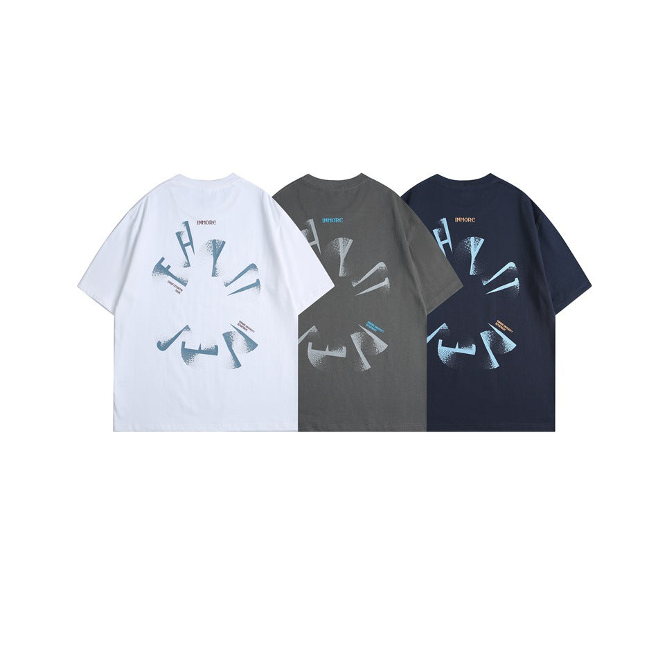 Back views of white, charcoal gray, and navy short-sleeve T-shirts with large distressed graphic prints.