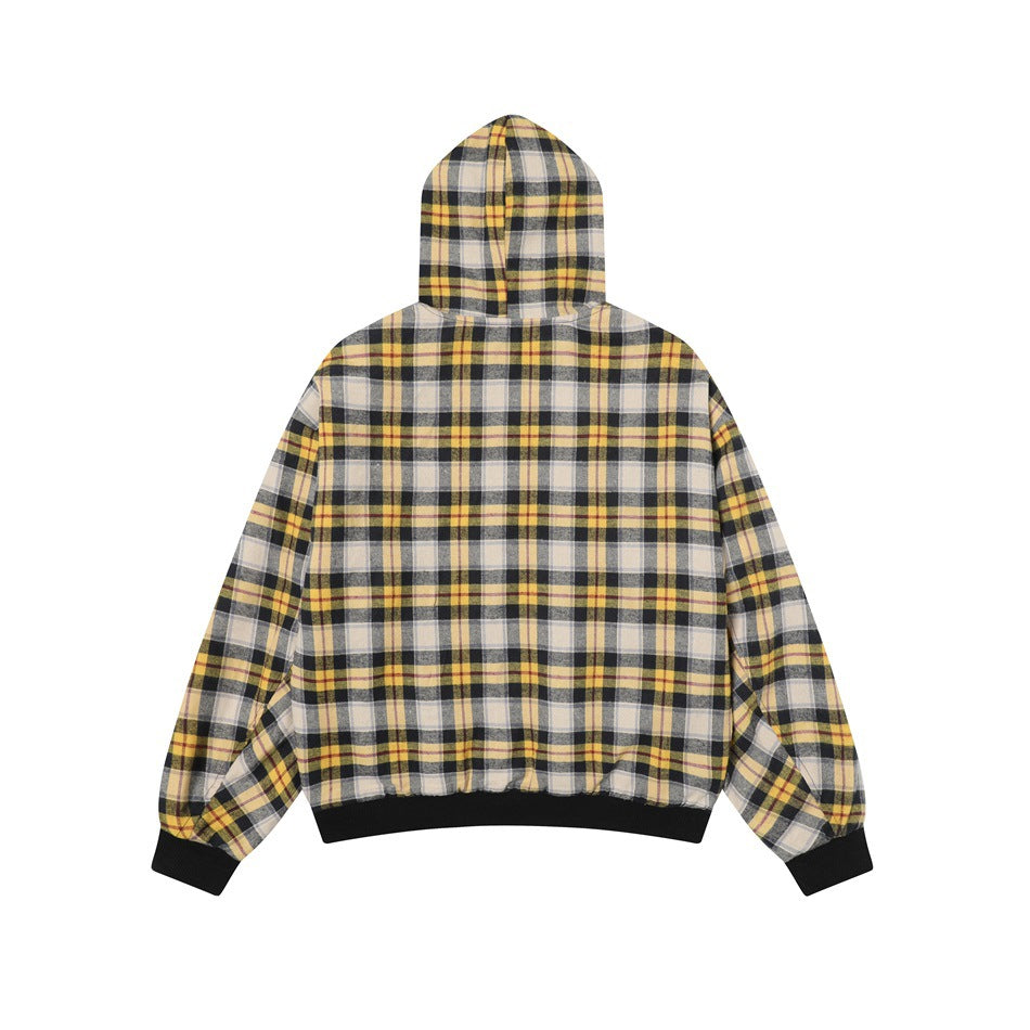 Back view of a hooded jacket in yellow, cream, gray, and black plaid with black ribbed cuffs and hem.