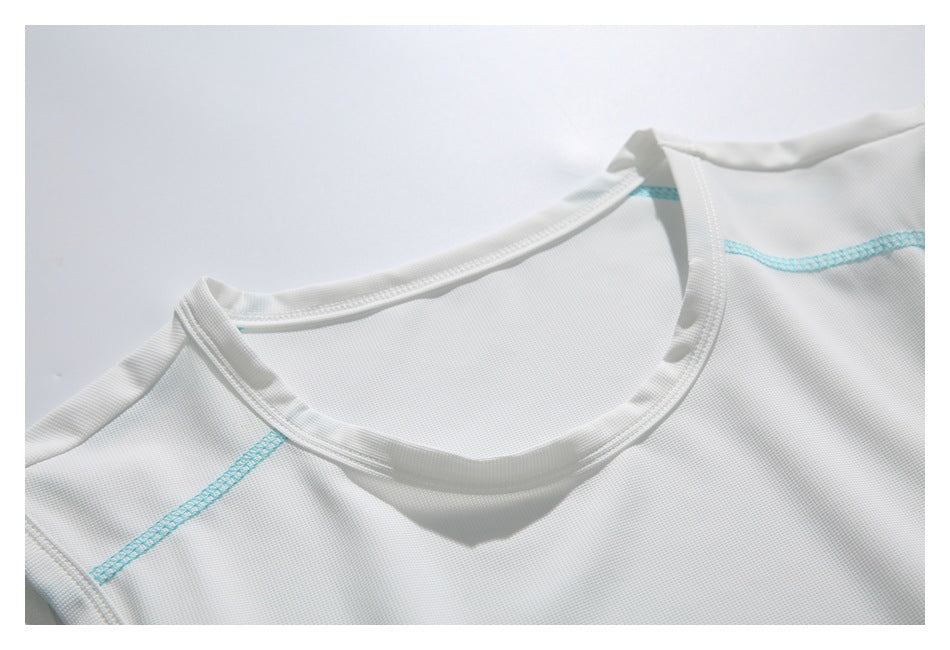 Close-up of a white garment's rounded neckline with turquoise stitching.