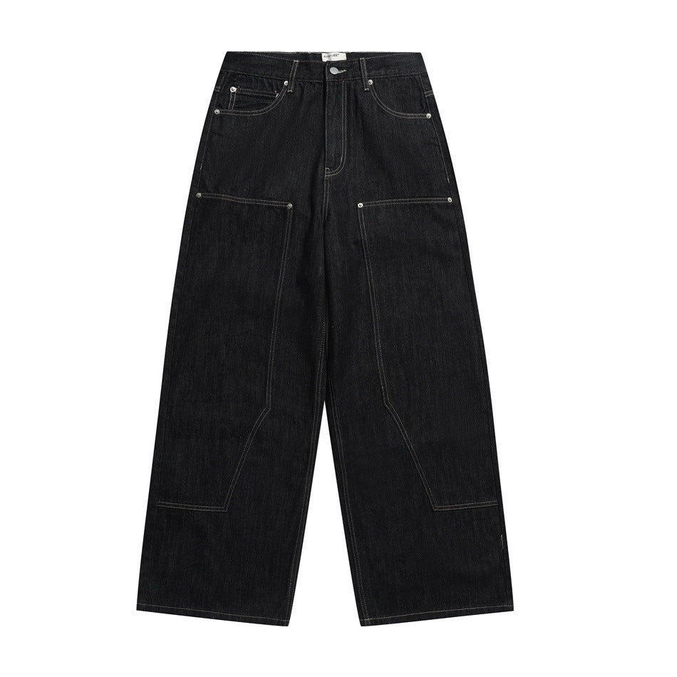 Black wide-leg carpenter-style jeans with contrast stitching, front view flat lay on white background