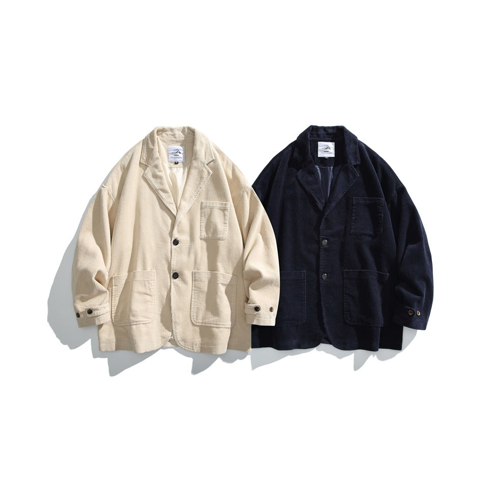 Cream and dark navy ribbed blazers displayed side by side, each with notch lapels and three patch pockets.