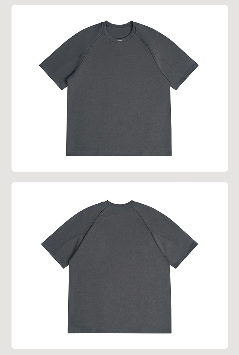 Catalog layout showing the front and back of a charcoal gray short-sleeve raglan crew-neck T-shirt.