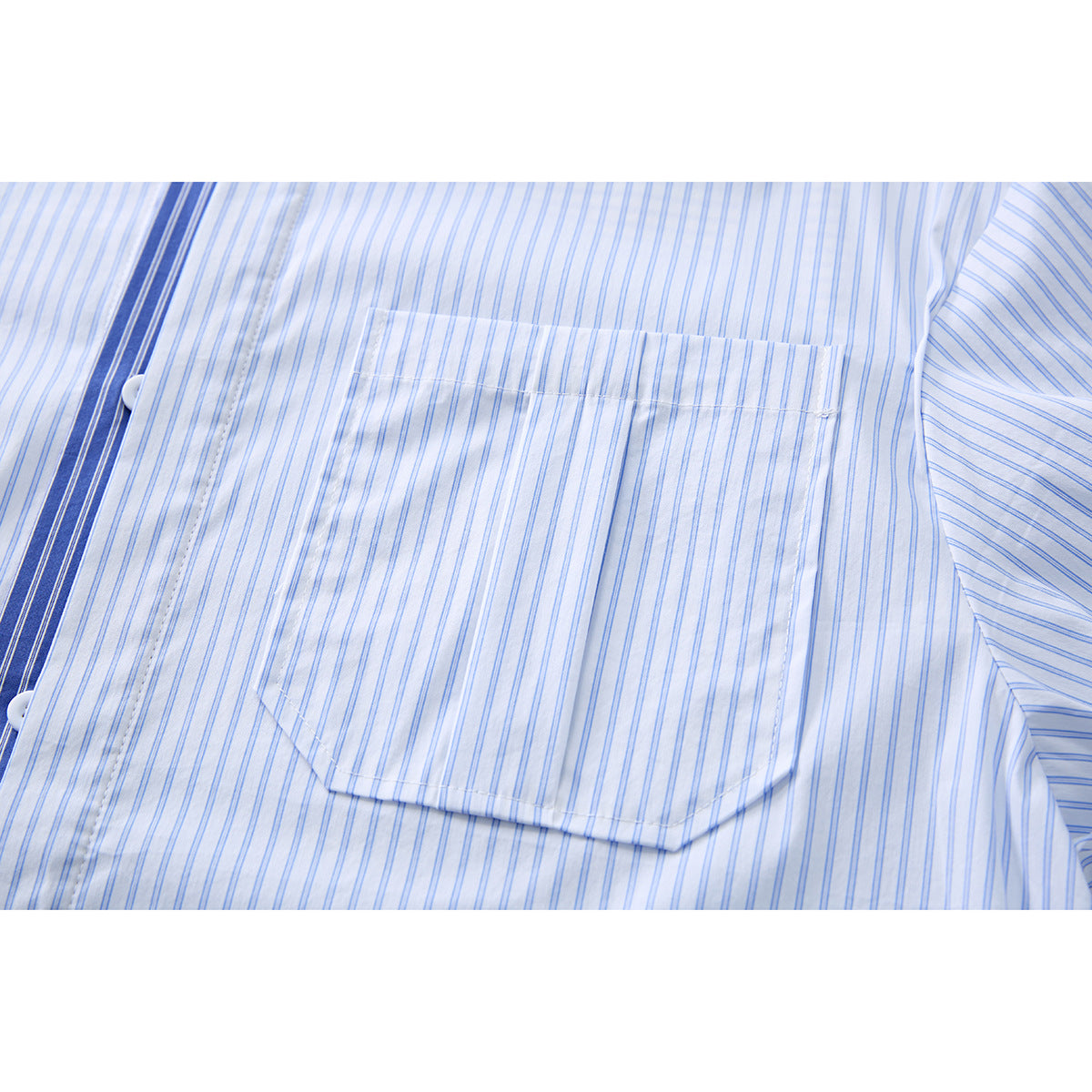 Close-up of a single chest pocket on a white shirt with fine blue stripes.