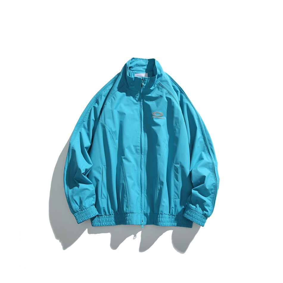 Sky blue zip-up stand-collar jacket with raglan sleeves, elastic hem and cuffs, flat lay on white