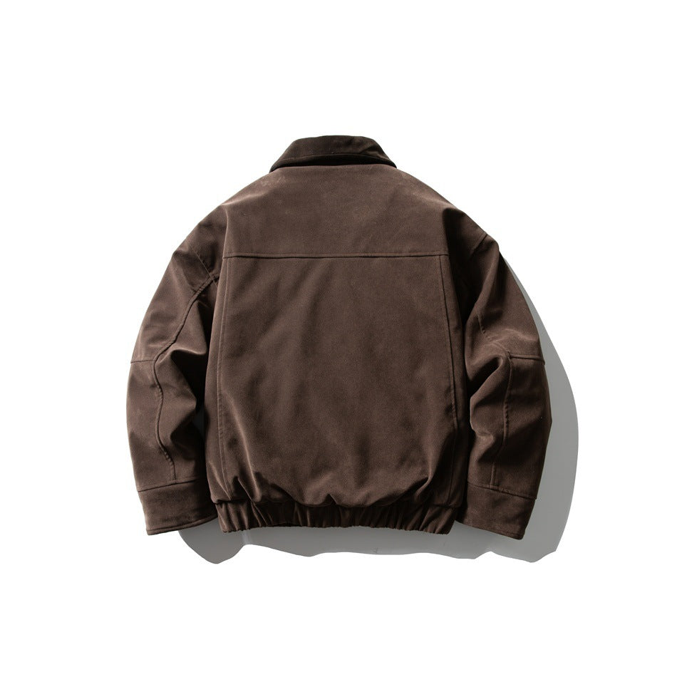 Back view of brown bomber-style jacket with yoke seam, seamed sleeves, cuffs and elasticized hem