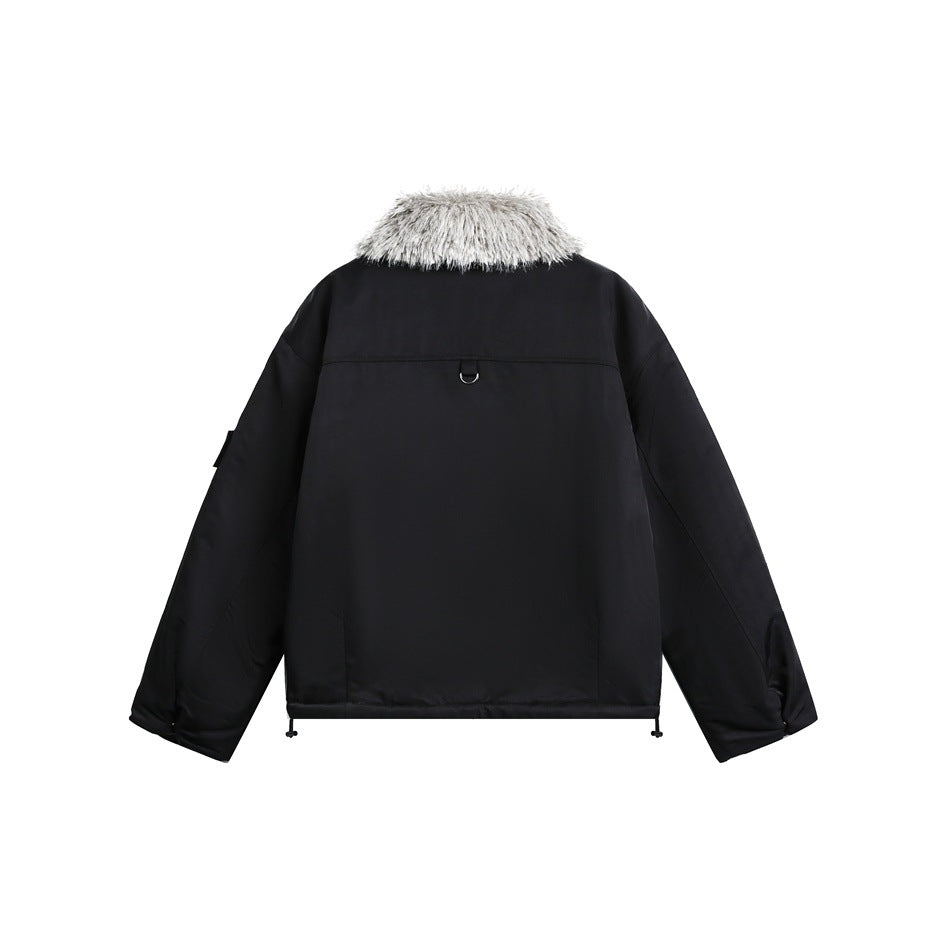 Back view of a black jacket with a pale shaggy collar, center seam and small metal loop.
