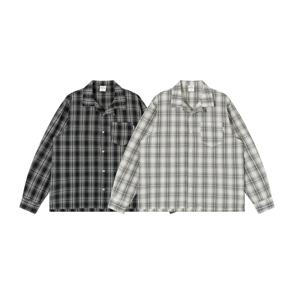 Two long-sleeve plaid button-up shirts shown from the front: one dark and one light.