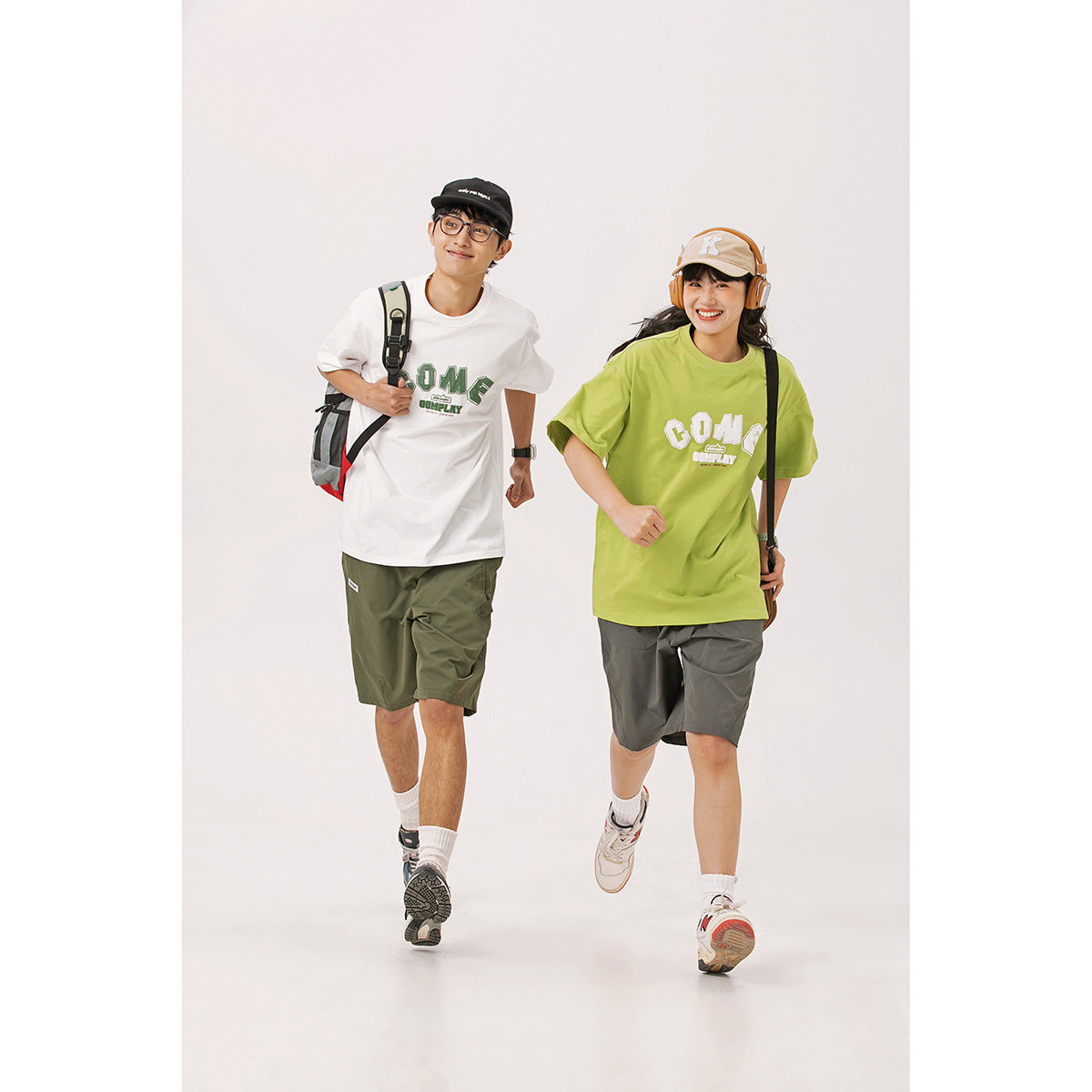 Two models wearing graphic T-shirts: white on the left and lime green on the right.