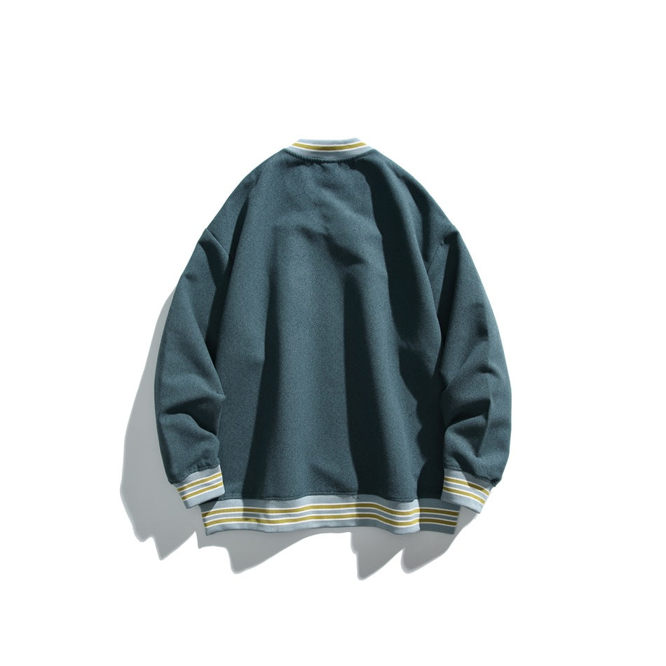 Back view of a dark teal sweatshirt with pale gray and mustard striped ribbed collar, cuffs, and hem.