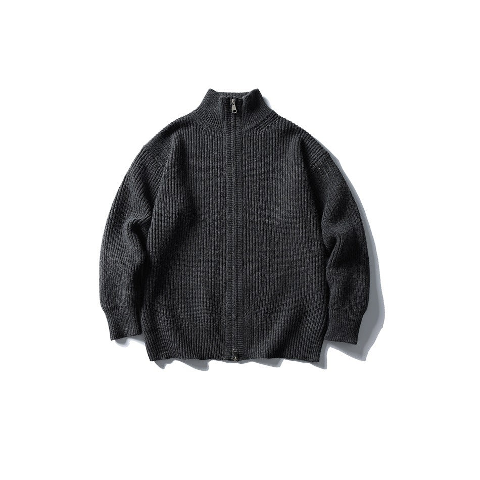 Dark gray ribbed knit zip-front sweater with stand collar, flat lay front view