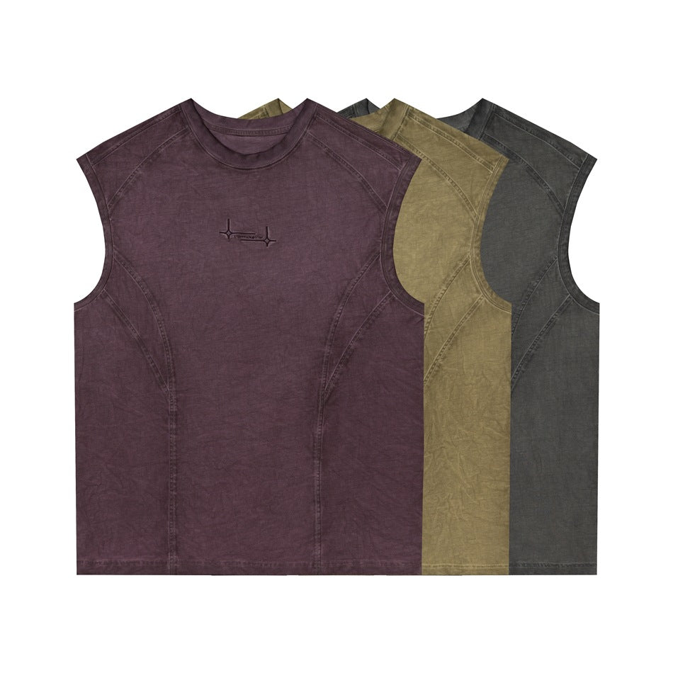 Three sleeveless crewneck tops with curved seams, shown in plum, olive, and charcoal; the plum front has chest embroidery.
