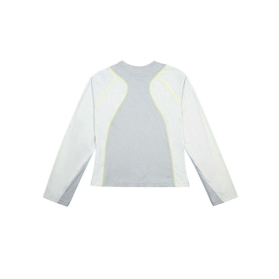 Flat view of a light gray and white long-sleeve athletic top with bright yellow seam stitching.
