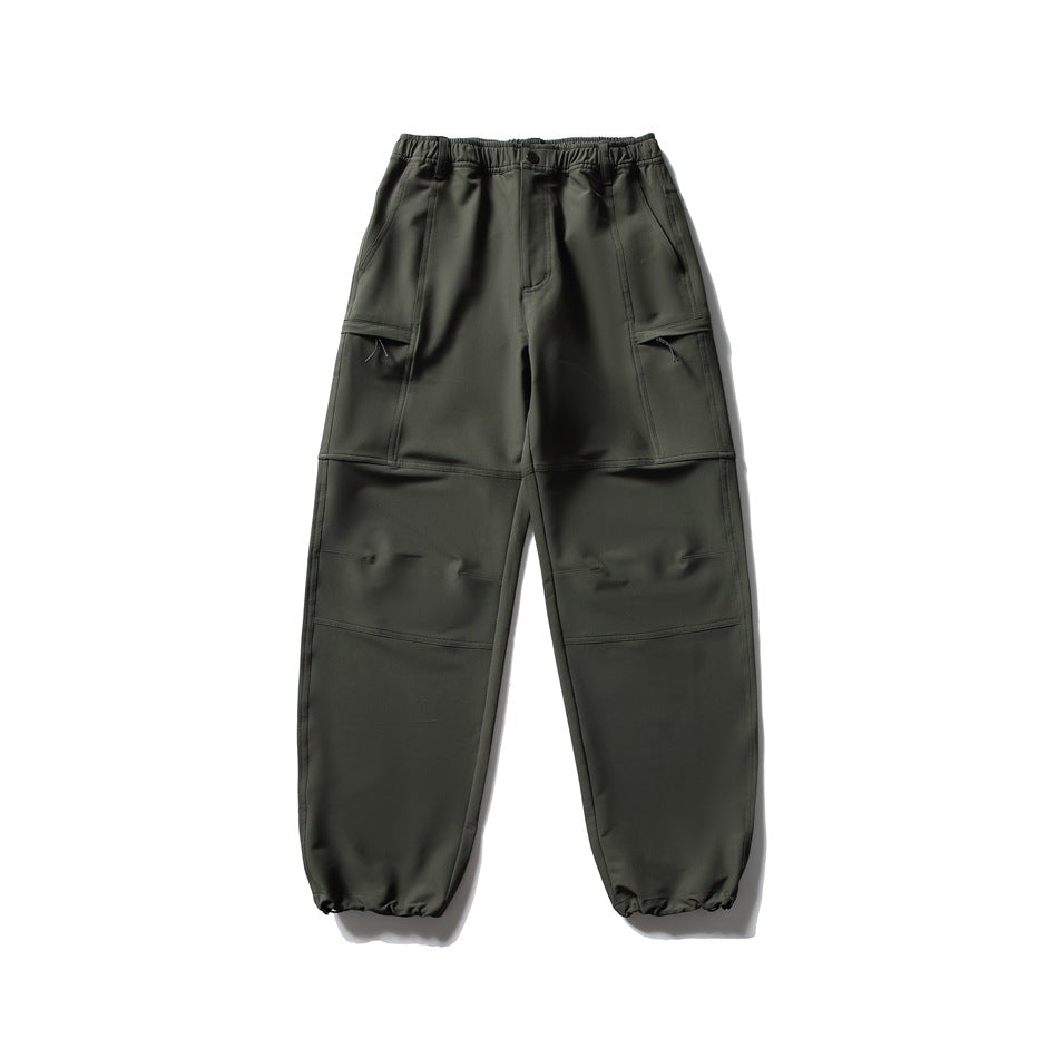 Army green relaxed cargo-style pants, flat front view, with elastic waist, zip thigh pockets and gathered hems
