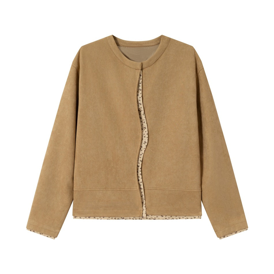 Camel brown collarless suede-look jacket with wavy front opening and cream floral trim, flat front view