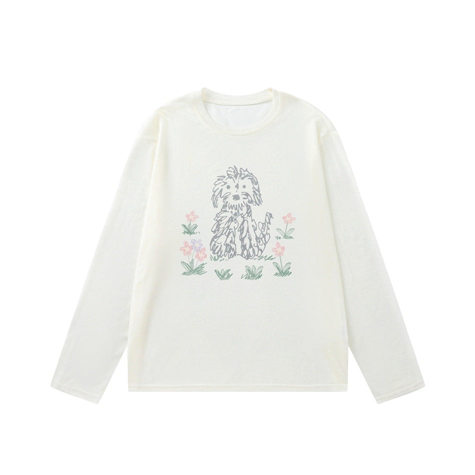 Off-white long-sleeve crew neck top with a gray sketch-style dog and flower print on the front, flat lay