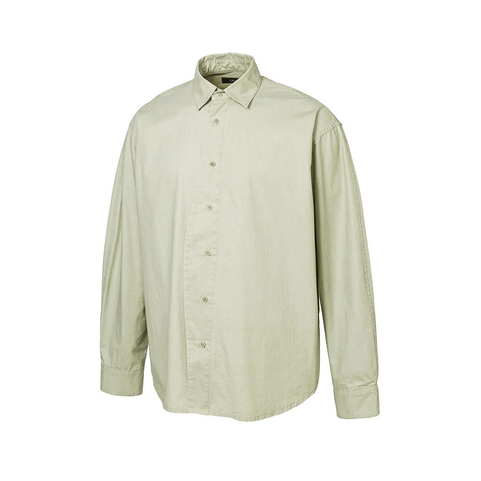 Light green long-sleeve button-up shirt with angled placket, shown flat from the front