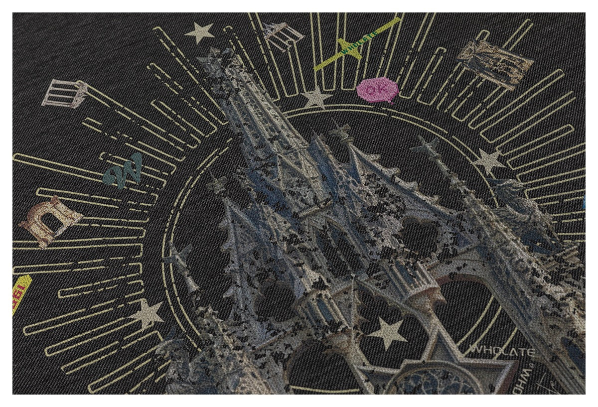 Close-up of the printed architectural scene, radiating lines and stars on the charcoal top.