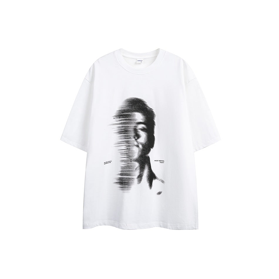White short-sleeve crew-neck T-shirt with a large blurred black portrait graphic on the front, flat lay