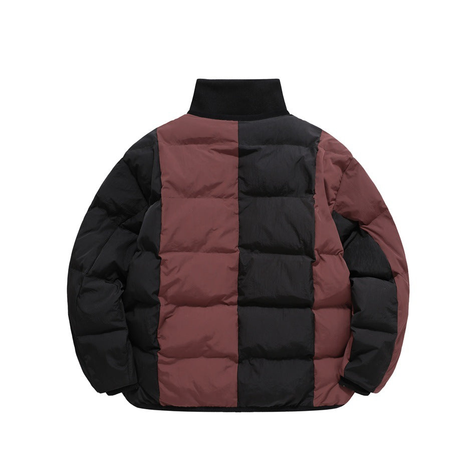 Back view of a puffer jacket with burgundy and black quilted panels, long sleeves, and a ribbed black collar.