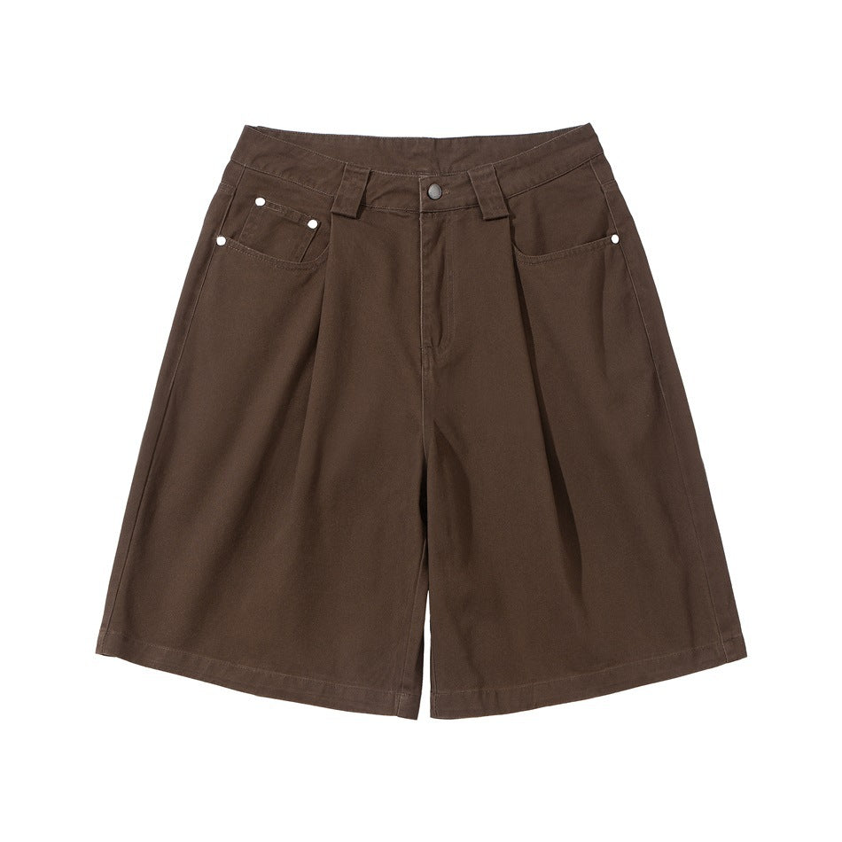 Brown pleated wide-leg knee-length shorts, front flat lay with button fly and rivet pockets