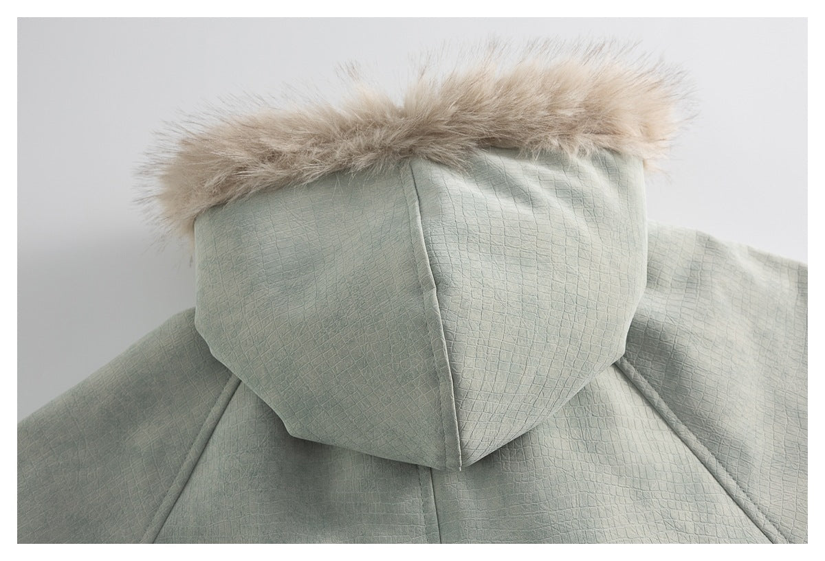 Close-up of the sage-green textured hood from behind, edged with beige faux fur.