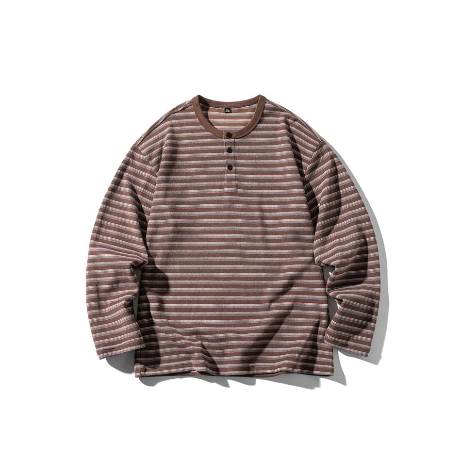 Brown striped long-sleeve henley-style top with three black buttons, shown flat from the front