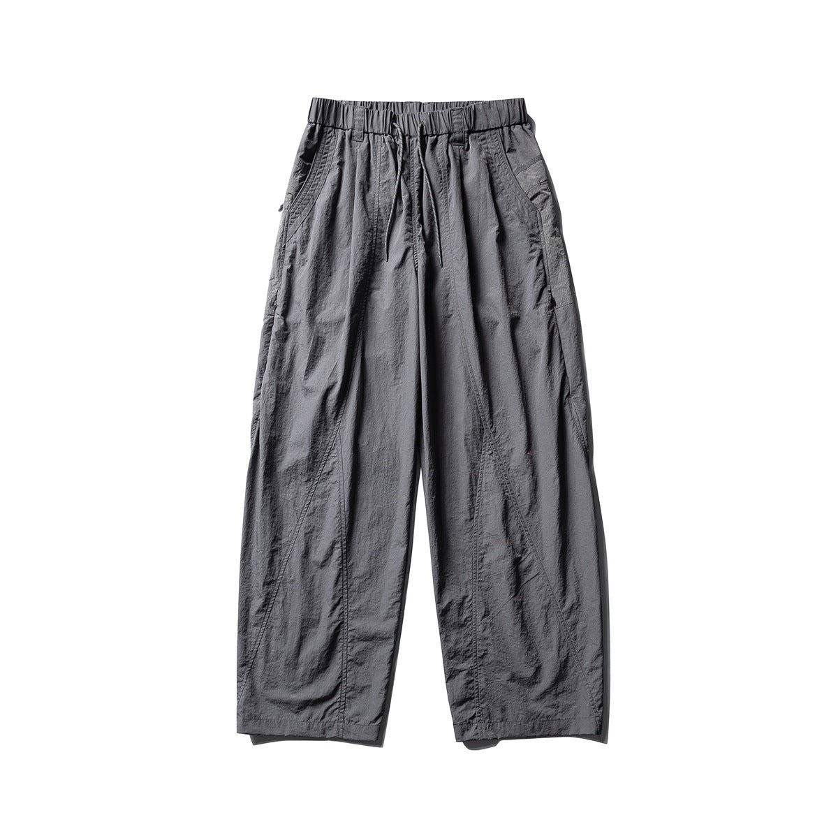 Dark gray wide-leg drawstring pants with elastic waist, side pockets and curved seam details, flat lay front view