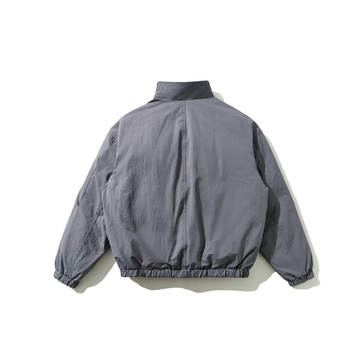Back view of a gray jacket with a stand collar, long sleeves, and elastic cuffs and hem.