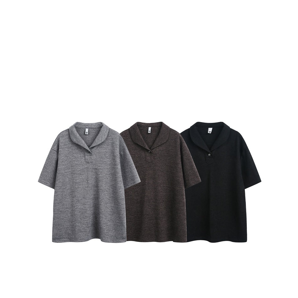 Three short-sleeve knit polo shirts with shawl collars shown in gray, dark brown, and black.