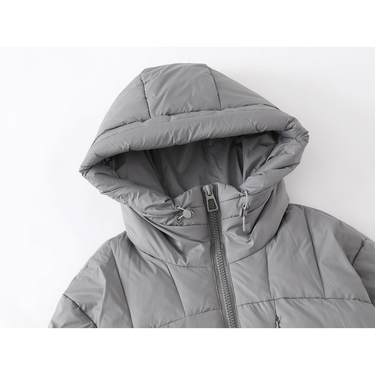 Close-up of a gray quilted jacket hood with drawcords, high collar and front zipper.