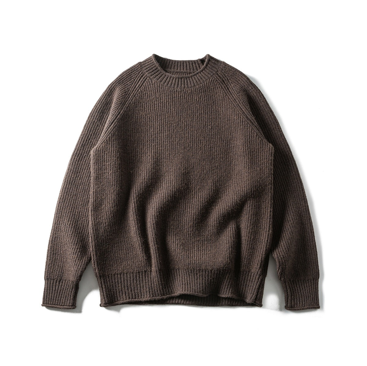 Coffee brown ribbed knit crew-neck raglan sweater laid flat, front view