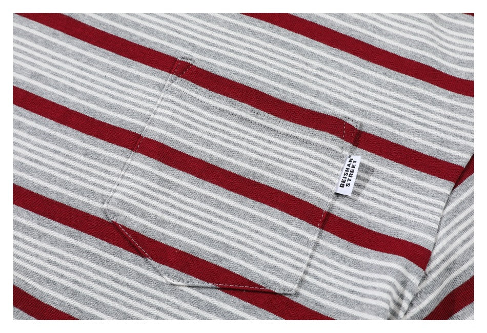 Close-up of a gray and white striped shirt with wide red stripes, a chest pocket and a small BEISHAN STREET label.