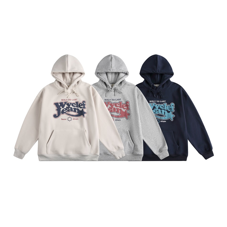 Three front-facing pullover hoodies in cream, heather gray, and navy, each with a chest graphic and kangaroo pocket.