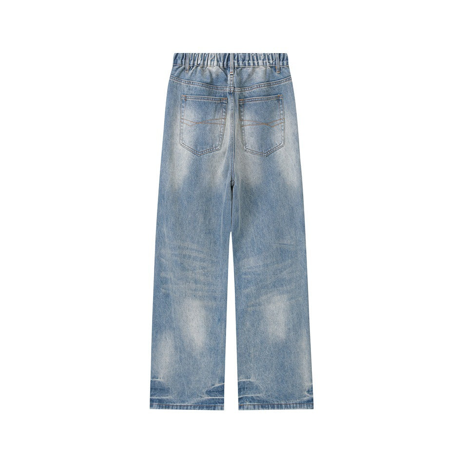 Back view of light blue faded wide-leg jeans, showing two rear pockets and a gathered elastic waistband.