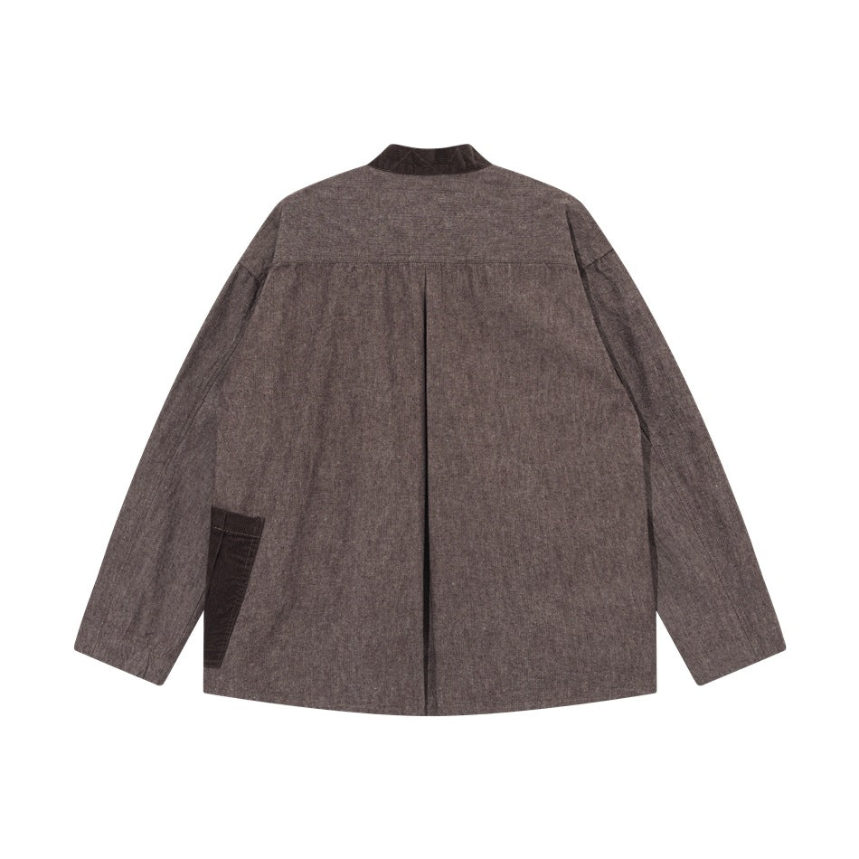 Back view of brown heathered jacket with center box pleat and dark corduroy collar and side patch