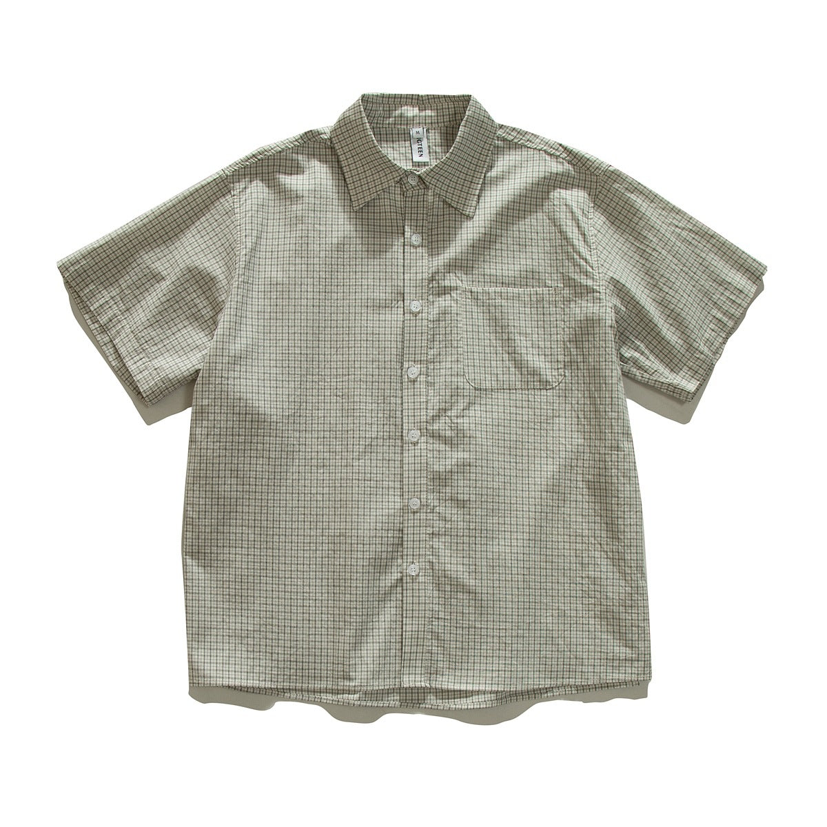 Sage green and cream small grid check short-sleeve button-up shirt with chest pocket, flat lay front view