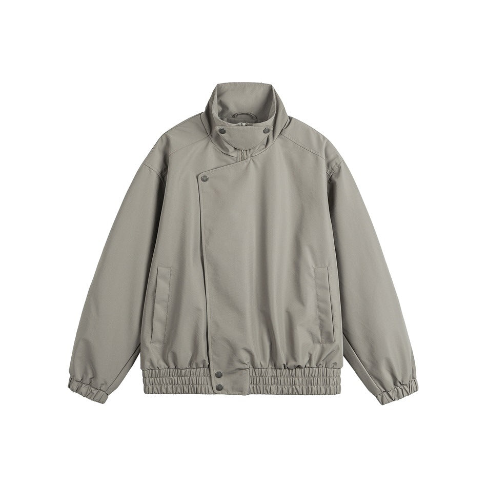 Gray stand-collar jacket with asymmetrical snap front, slanted pockets and elastic cuffs and hem, flat lay front view