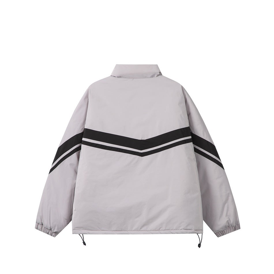 Back view of a light gray jacket with black-and-white chevron stripes, elastic cuffs, and adjustable hem cords.