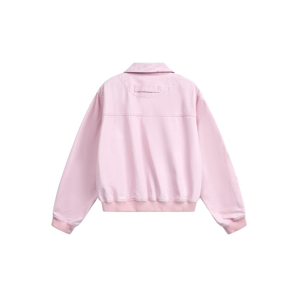 Back view of a light pink cropped jacket with a pointed collar, long sleeves, ribbed cuffs and hem, and a back yoke.