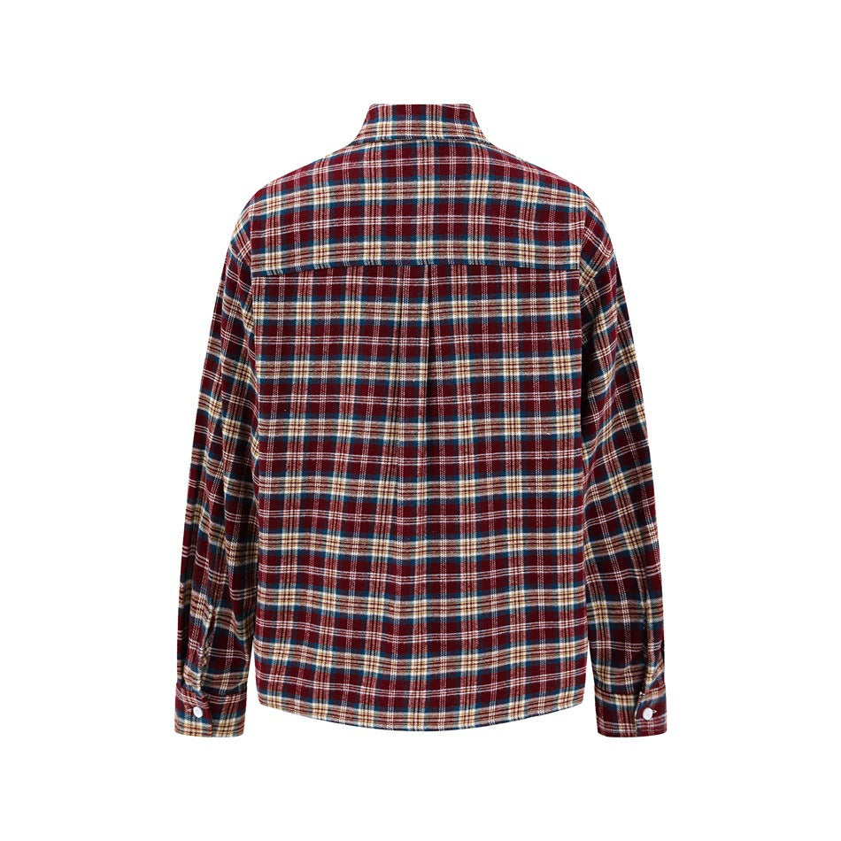 Back view of a long-sleeve burgundy, navy, cream and tan plaid button-up shirt.