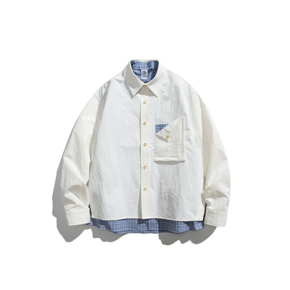 Front view of an off-white button-up shirt with a pointed collar, chest pocket, and blue plaid lining and trim.