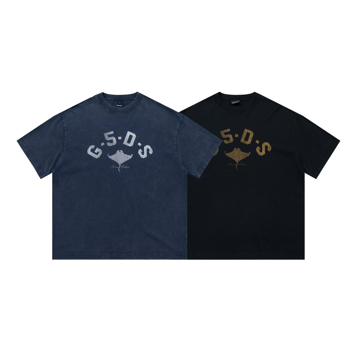Two short-sleeve graphic T-shirts shown from the front in washed navy and black.
