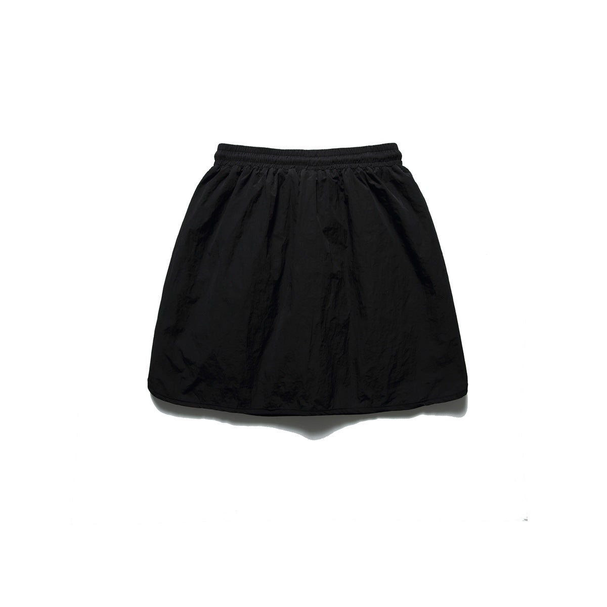 Black mini skort laid flat, back view, with elastic waistband and plain crinkled back panel