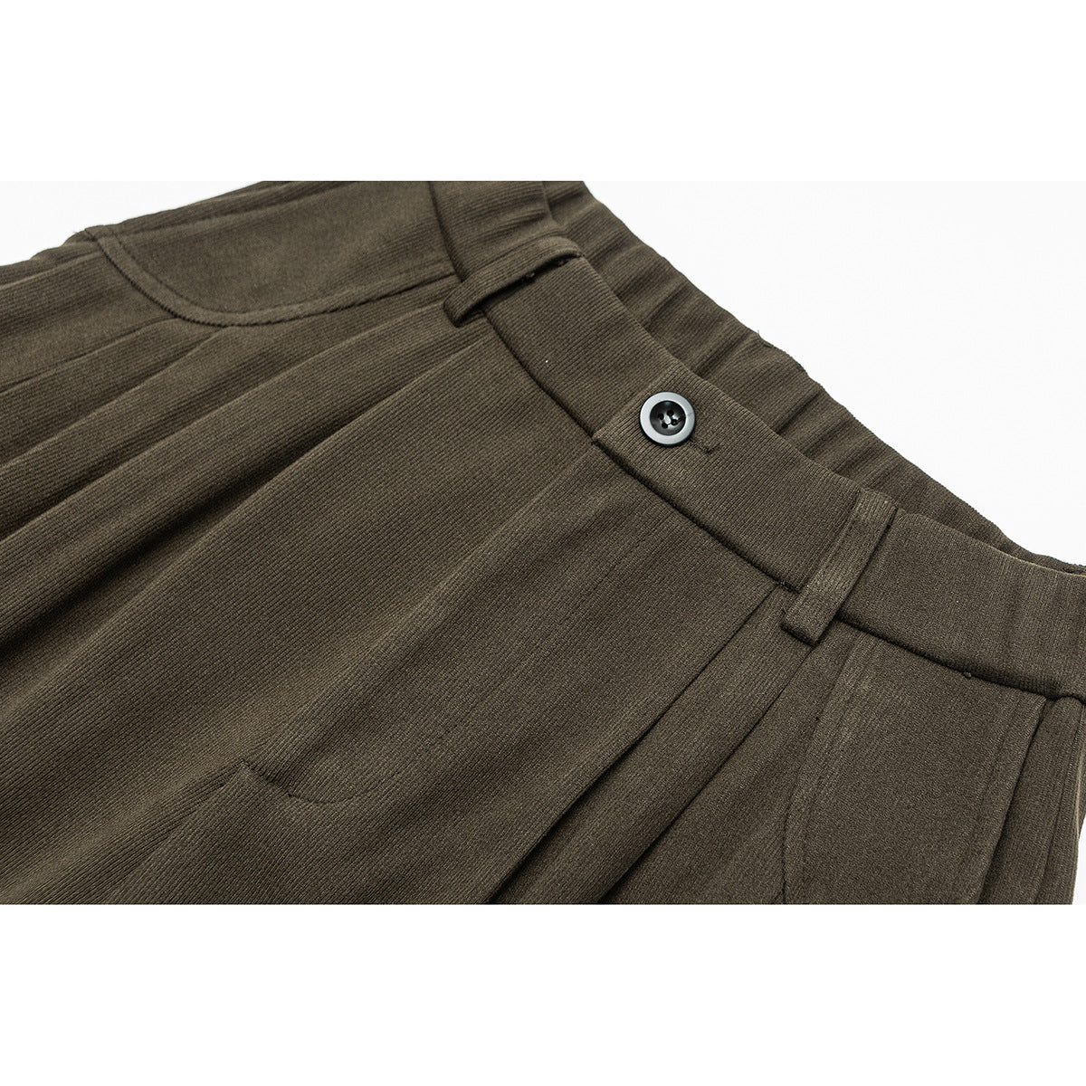 Close-up of olive-brown trousers showing the waistband, button closure, belt loop, pleat and pocket opening.