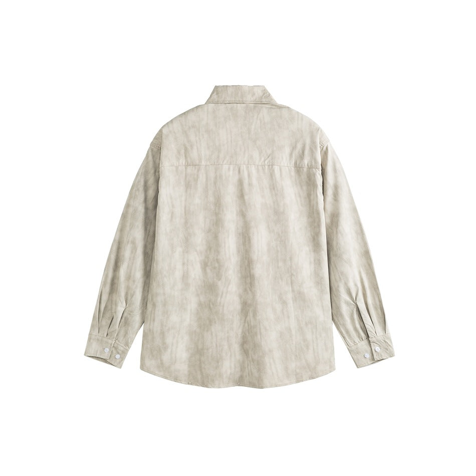Back view of a light beige mottled long-sleeve shirt with a yoke seam and buttoned cuffs.