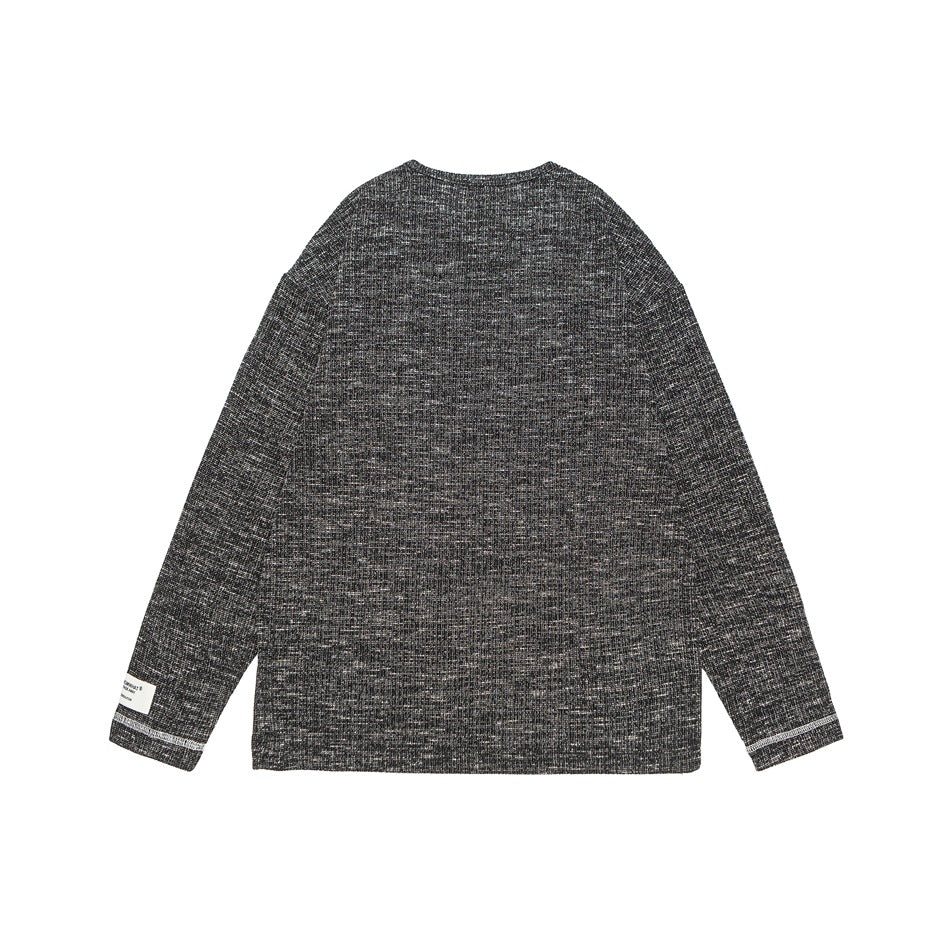 Back view of a charcoal marled long-sleeve shirt with white flecks, laid flat on a white background.