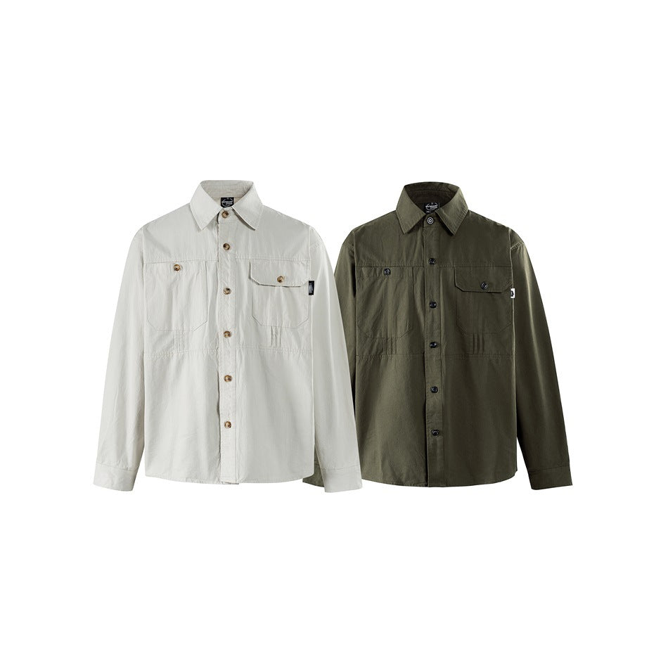 Two button-up shirts shown from the front: one off-white and one dark olive, each with two chest pockets.