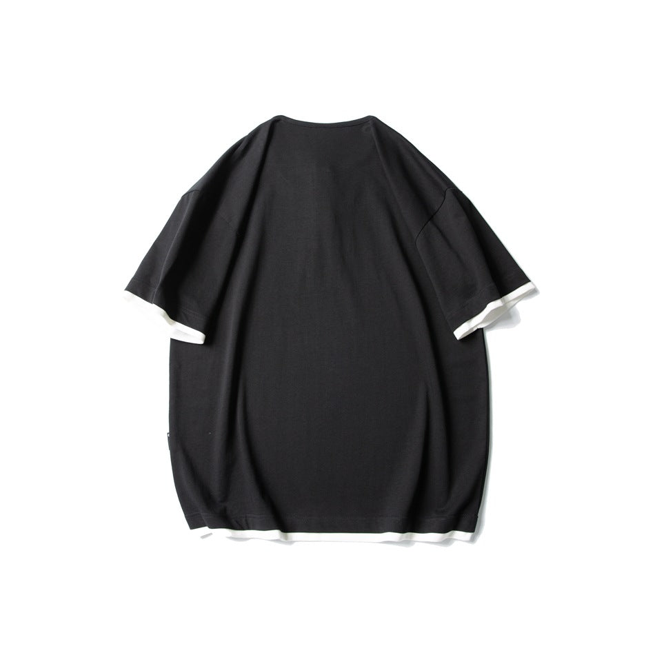 Black short-sleeve T-shirt back view with white trim at sleeve hems and bottom hem, flat lay
