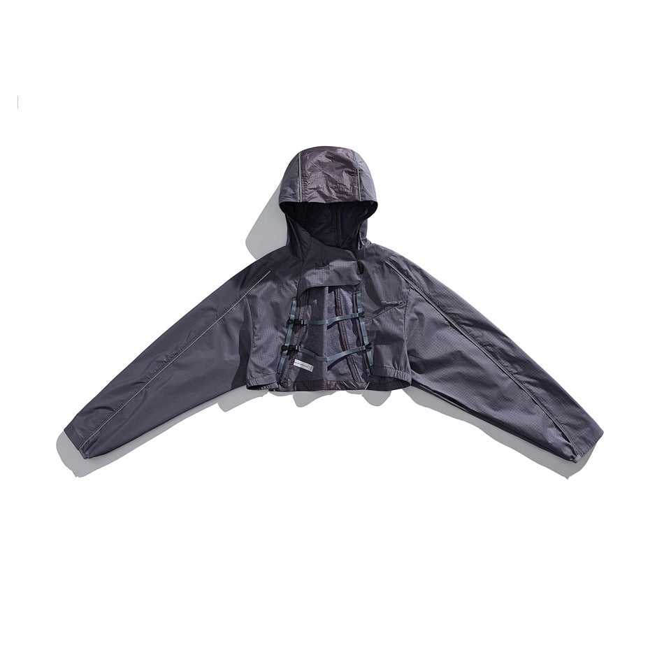 Front view of a dark charcoal hooded jacket laid flat with its long sleeves spread wide.