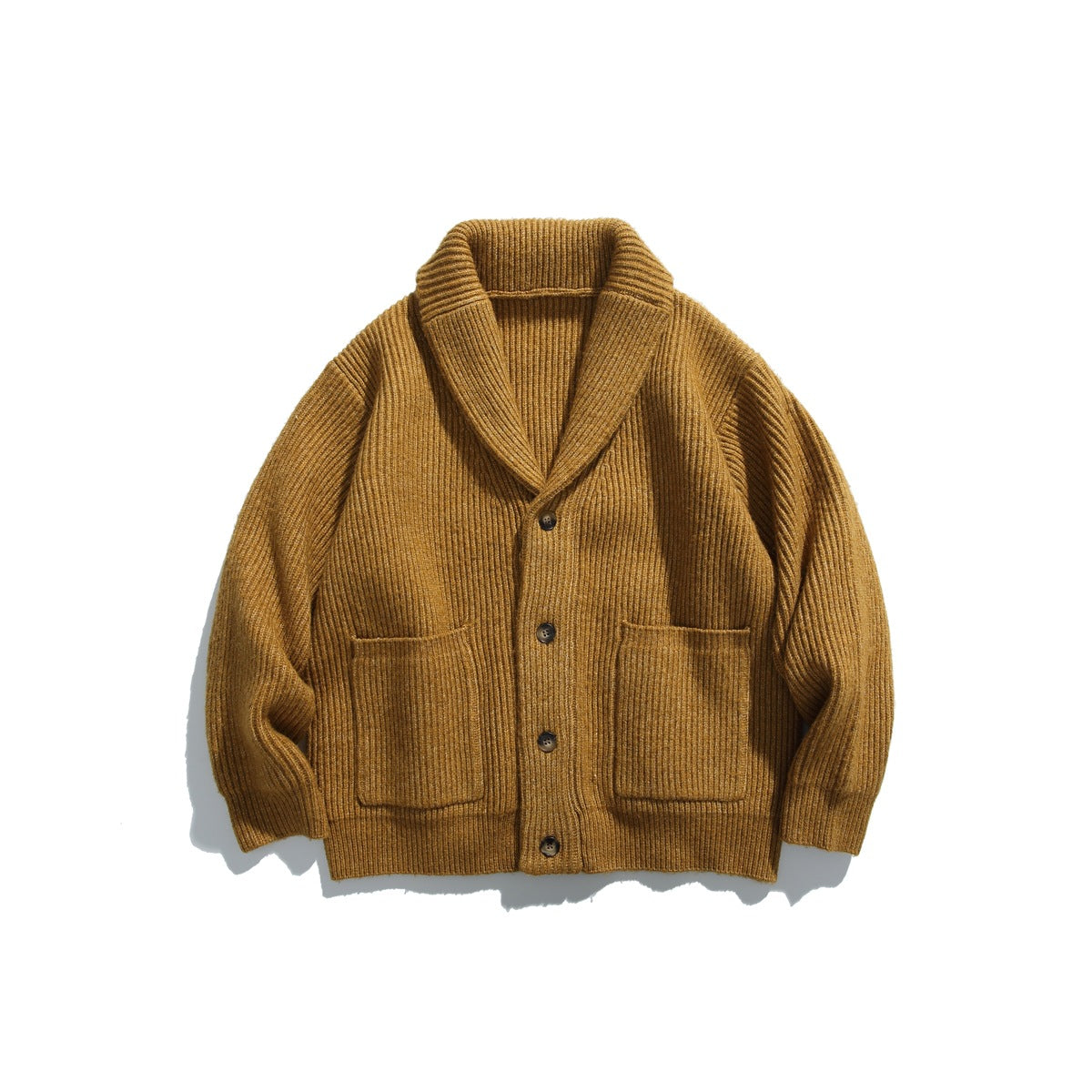 Turmeric yellow ribbed knit shawl-collar cardigan with four buttons and two patch pockets, flat lay